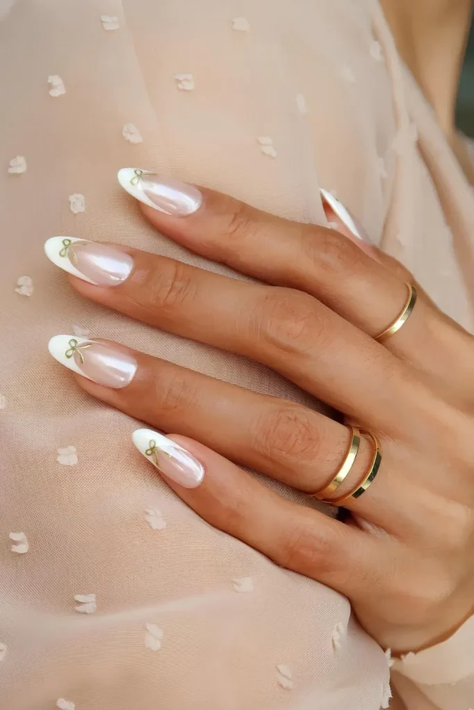 Coquette French manicure with bows and white tips