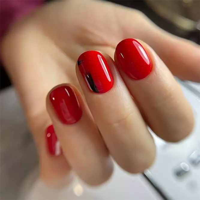 glittery red acrylic nails