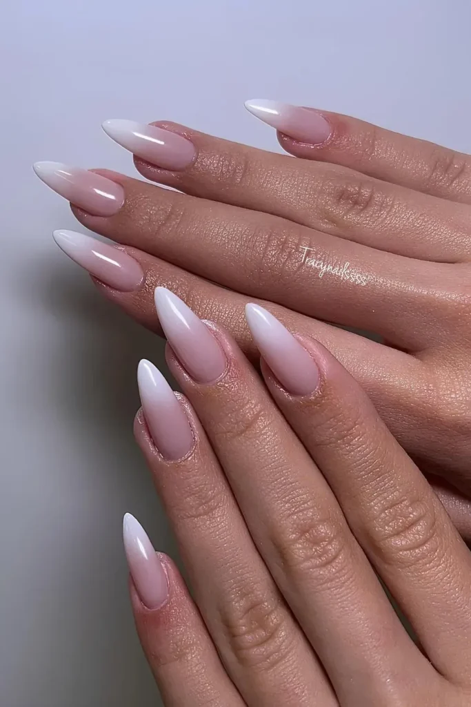 Ombre French manicure blending nude into white tips