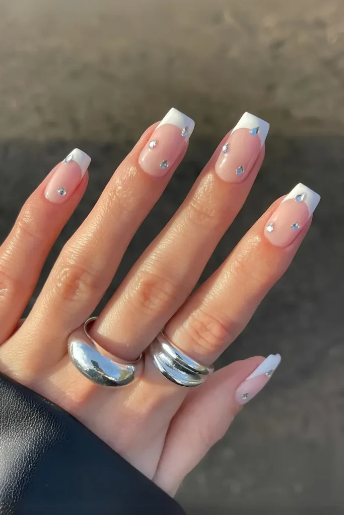 White French manicure with diamond rhinestone accents