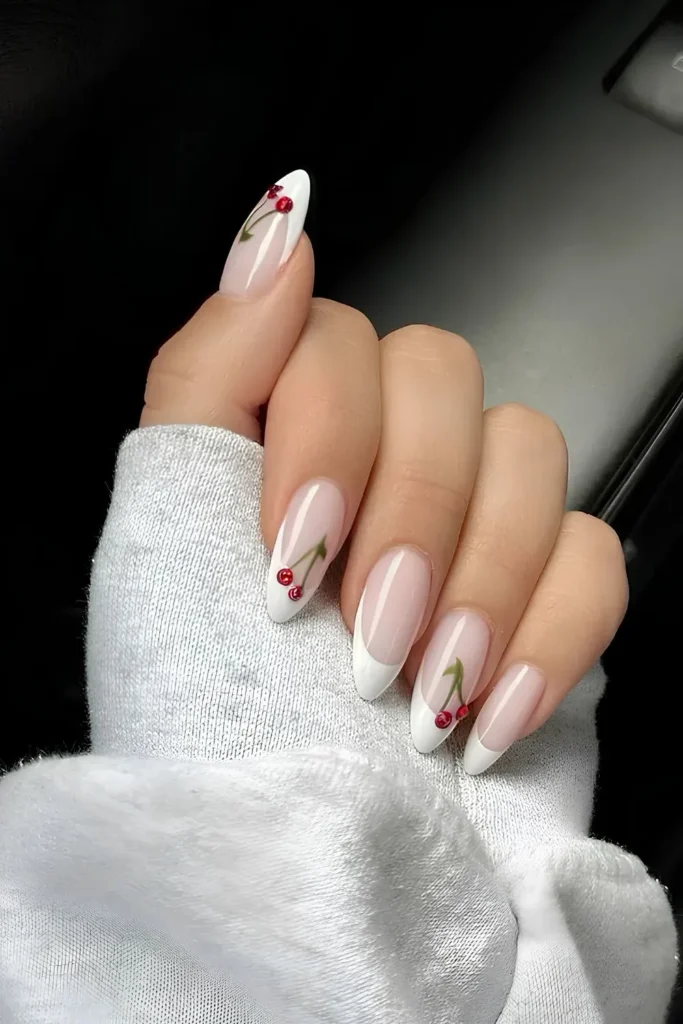 French manicure with cherry nail art on white tips