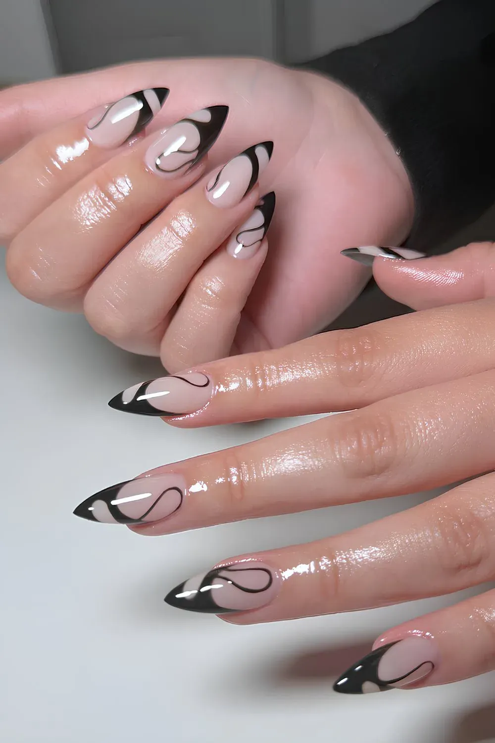 swirly black French tips
